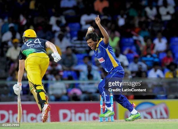 Adam Voges of Jamaica Tallawahs run out by Jeevan Mendis of Barbados Tridents during a match between Barbados Tridents and Jamaica Tallawahs as part...