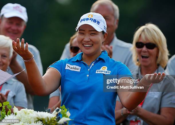 Mirim Lee of South Korea celebrates after winning the Meijer LPGA Classic at Blythefield Country Club on August 10, 2014 in Belmont, Michigan.