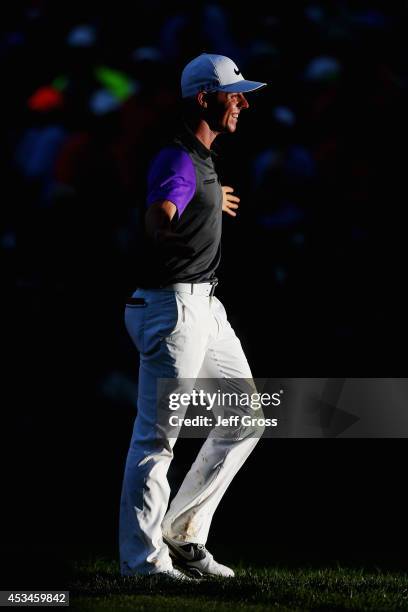 Rory McIlroy of Northern Ireland celebrates his one-stroke victory on the 18th green during the final round of the 96th PGA Championship at Valhalla...