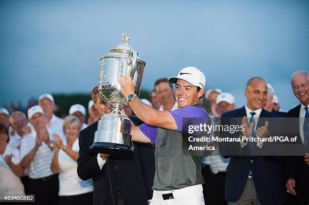 Rory McIlroy of Northern Ireland poses with the Wanamaker Trophy after his win during the Final Round of the 96th PGA Championship, at Valhalla Golf...