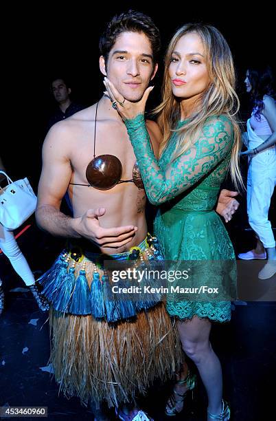 Host Tyler Posey and actress-singer Jennifer Lopez attend FOX's 2014 Teen Choice Awards at The Shrine Auditorium on August 10, 2014 in Los Angeles,...