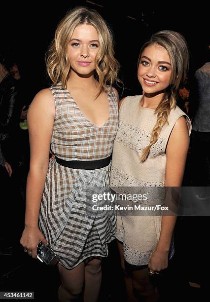 Actress Sasha Pieterse and host Sarah Hyland attend FOX's 2014 Teen Choice Awards at The Shrine Auditorium on August 10, 2014 in Los Angeles,...