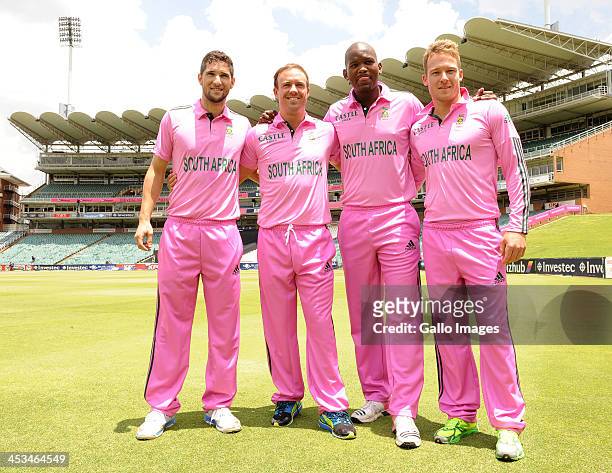 Wayne Paenell, AB de Villiers, Lonwabo Tsotsobe and David Milles show off their pink outfits during the South African national cricket team training...