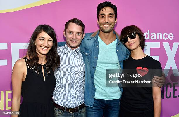 Actress Sheila Vand, producer Elijah Wood, actor Dominic Rains and director Ana Lily Amirpour attend the screening of "A Girl Walks Home Alone at...