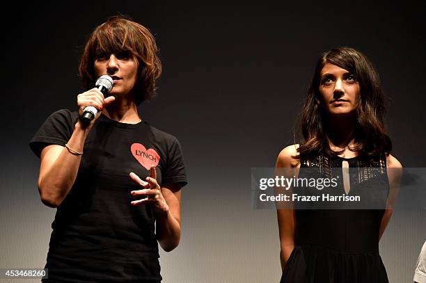 Director Ana Lily Amirpour and actress Sheila Vand speak onstage during the screening of "A Girl Walks Home Alone at Night" with Warpaint in concert...