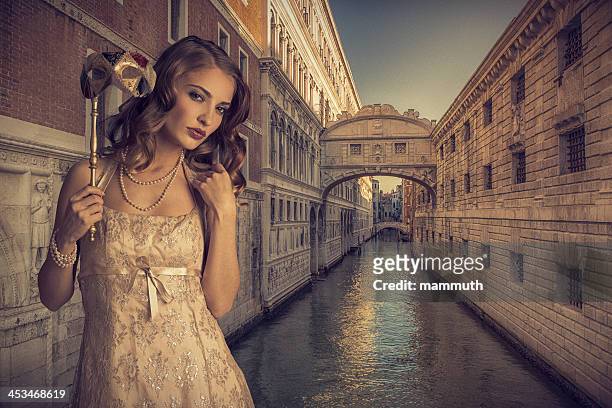 girl with venetian mask - venice carnival 2013 stock pictures, royalty-free photos & images