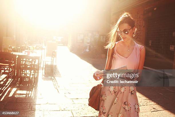 street style fashion - females walking stock pictures, royalty-free photos & images