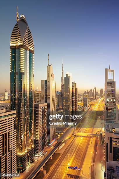 dubai downtown modern skyscrapers twilight scene - burj al arab night stock pictures, royalty-free photos & images