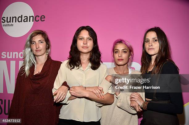 Musicians Emily Kokal, Stella Mozgawa, Jenny Lee Lindberg and Theresa Wayman of Warpaint attend the screening of "A Girl Walks Home Alone at Night"...