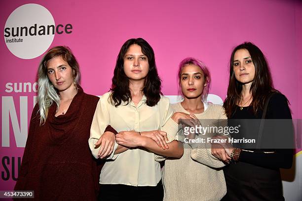Musicians Emily Kokal, Stella Mozgawa, Jenny Lee Lindberg and Theresa Wayman of Warpaint attend the screening of "A Girl Walks Home Alone at Night"...