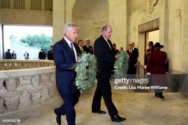 Secretary of Defence Chuck Hagel and Australian Defence Minister David Johnston attend a wreath laying ceremony on August 11, 2014 in Sydney,...