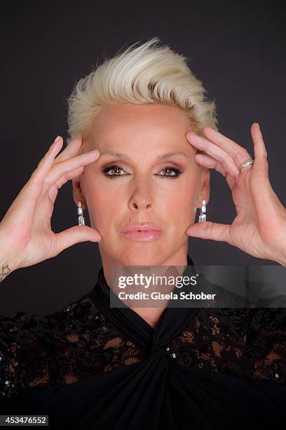 Brigitte Nielsen poses during a portrait session on July 6, 2014 in Milan, Italy.