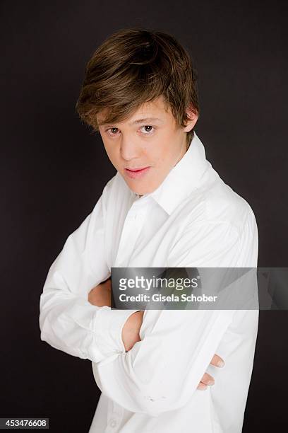 Raoul Ayrton Meyer Jr., son of Brigitte Nielsen, poses during a portrait session on July 6, 2014 in Milan, Italy.