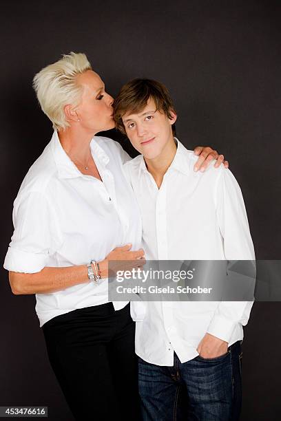 Brigitte Nielsen and her son Raoul Ayrton Meyer Jr. Pose during a portrait session on July 6, 2014 in Milan, Italy.
