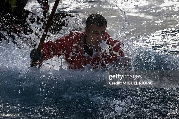 Galician "Percebeiro" collects barnacles from the rocks at Vido Bay, near the village of Cangas, on November 27, 2013. Christmas diners pay...