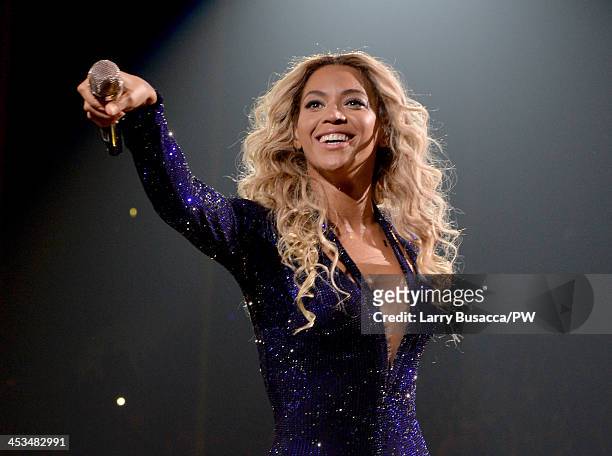 Entertainer Beyonce performs on stage during "The Mrs. Carter Show World Tour" at the Staples Center on December 3, 2013 in Los Angeles, California.