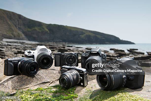 Selection of lightweight cameras for ideal for landscape photography: Panasonic DMC-GF6, Pentax K-30, Sony Alpha NEX-3N, Olympus PEN E-PM2, Canon EOS...