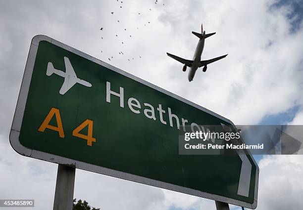 An airliner comes in to land at Heathrow Airport on August 11, 2014 in London, England. Heathrow is the busiest airport in the United Kingdom and the...