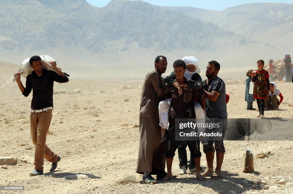 Yezidis trapped in the Sinjar mountains are rescued
