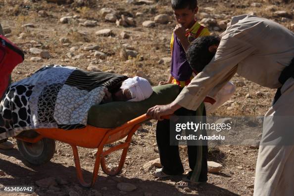 Yezidis trapped in the Sinjar mountains are rescued Yezidis trapped in the Sinjar mountains are rescued
