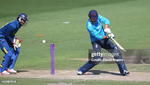 James Vince of England is bowled during the Triangular Series match between England Lions and Sri Lanka A at New Road on August 11, 2014 in...