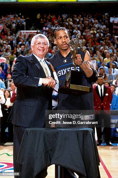Allen Iverson of the Philadelphia 76ers receives the league MVP trophy from NBA Commissioner David Stern prior to the game against the Toronto...