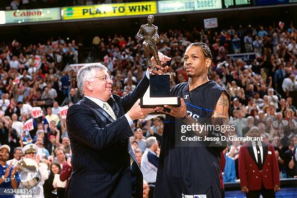 Allen Iverson of the Philadelphia 76ers receives the league MVP trophy from NBA Commissioner David Stern prior to the game against the Toronto...