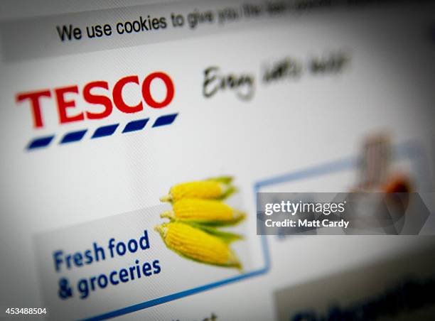 In this photo illustration a laptop displays the Tesco website on August 11, 2014 in Bristol, United Kingdom. This week marks the 20th anniversary of...