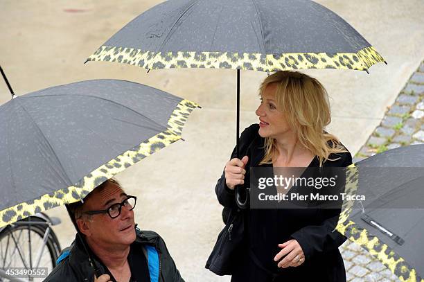 Director Jean Jacques Zilbermann and Actress Johanna Ter Steege attend the 'A La Vie' Photocall during the 67th Locarno Film Festival on August 11,...