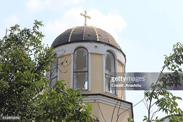 Church is destroyed as a result of shelling of Ukraine troops in Donetsk, Ukraine on August 11, 2014. People leave from the Donetsk due to clashes...