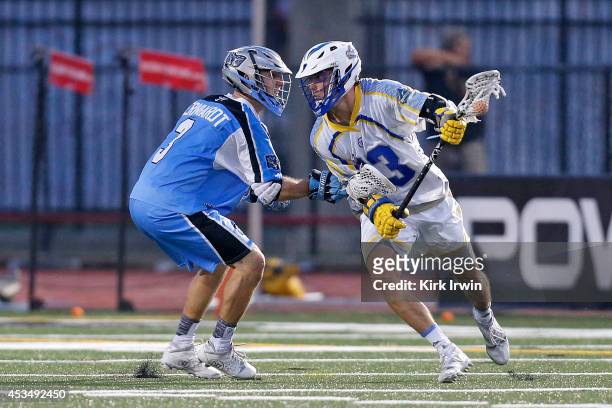 Jake Bernhardt of the Ohio Machine defends against David Earl of the Florida Launch on August 9, 2014 at Selby Stadium in Delaware, Ohio. Ohio...