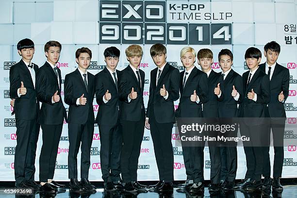 Members of boy band EXO attend the press conference for Mnet EXO 902014 at CJ E&M Center on August 11, 2014 in Seoul, South Korea. The program will...