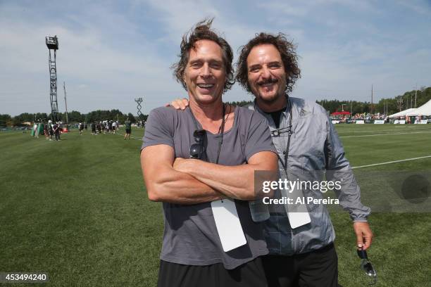 Actors William Fichtner and Kim Coates visit the New York Jets training camp at SUNY Cortland on August 11, 2014 in Cortland, New York.