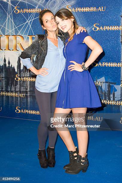 Renee Weibel and Jasmin Lord attend the premiere of 'Saphirblau' at the Cinedom on August 11, 2014 in Cologne, Germany.