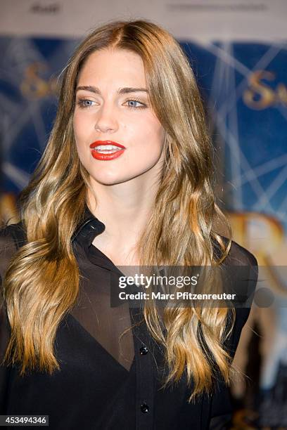 Actress Laura Berlin attends the premiere of 'Saphirblau' at the Cinedom on August 11, 2014 in Cologne, Germany.