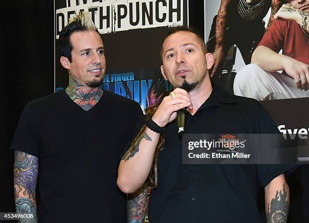 Drummer Jeremy Spencer and guitarist Zoltan Bathory of Five Finger Death Punch speak at Nellis Air Force Base as the band highlights its campaign to...