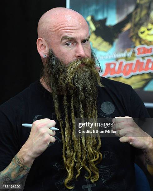 Bassist Chris Kael of Five Finger Death Punch appears at Nellis Air Force Base as the band highlights its campaign to raise awareness about veterans...