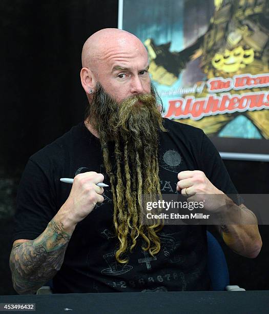 Bassist Chris Kael of Five Finger Death Punch appears at Nellis Air Force Base as the band highlights its campaign to raise awareness about veterans...