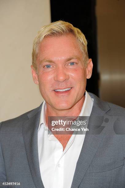 Sam Champion attends a shopping event at Elie Tahari Vault on August 11, 2014 in New York City.