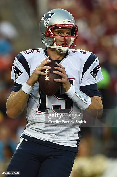 Quarterback Ryan Mallett of the New England Patriots looks to pass against the Washington Redskins during a preseason NFL game at FedExField on...