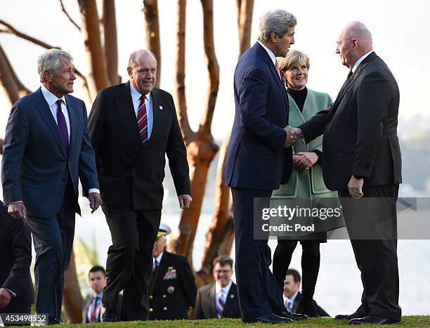 Secretary of State John Kerry , along with US Secretary of Defence Chuck Hagel , Australian Defence Minister David Johnston , and Australian Foreign...