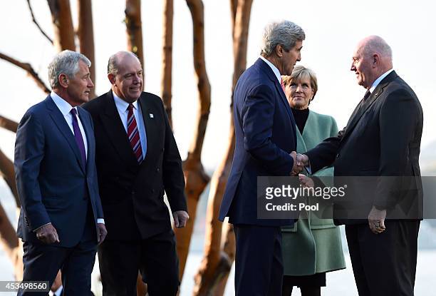 Secretary of State John Kerry , along with US Secretary of Defence Chuck Hagel , Australian Defence Minister David Johnston , and Australian Foreign...