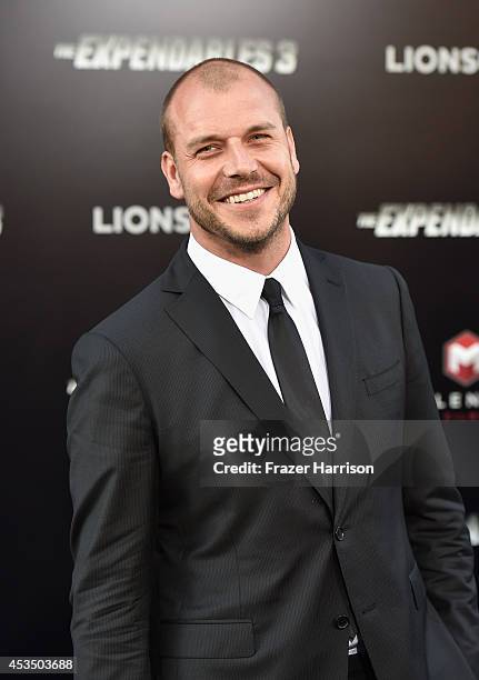 Director Patrick Hughes attends Lionsgate Films' "The Expendables 3" premiere at TCL Chinese Theatre on August 11, 2014 in Hollywood, California.