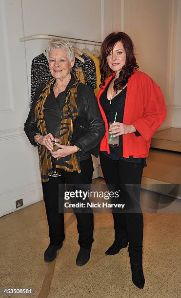 Dame Judi Dench and Finty Williams attend as the Christmas lights are switched on at Stella McCartney on December 4, 2013 in London, England.