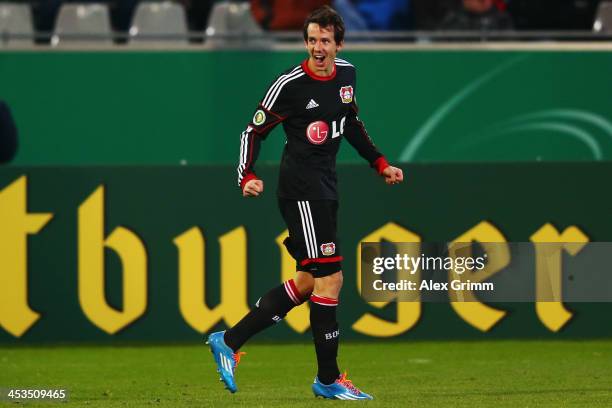 Robbie Kruse of Leverkusen celebrates his team's first goal during the German Cup Round of 16 match between SC Freiburg and Bayer Leverkusen at MAGE...