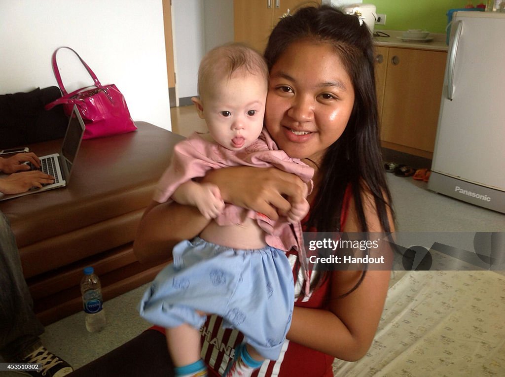 Biological Parents Leave Down's Syndrome Twin With Thai Surrogate Mum