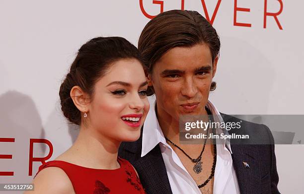 Actors Odeya Rush and Brenton Thwaites attend "The Giver" premiere at Ziegfeld Theater on August 11, 2014 in New York City.