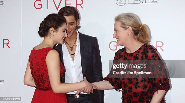 Actors Odeya Rush, Brenton Thwaites and Meryl Streep attend "The Giver" premiere at Ziegfeld Theater on August 11, 2014 in New York City.