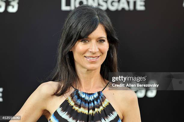 Actress Perrey Reeves arrives at the Los Angeles premiere of Lionsgate Films' "The Expendables 3" at TCL Chinese Theatre on August 11, 2014 in...