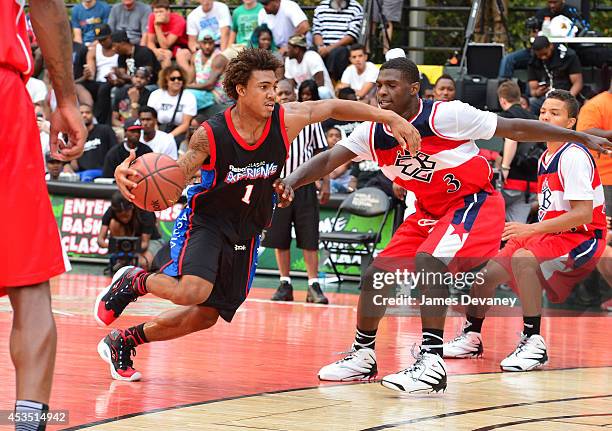 Reebok Breakout Camp All Star players compete against EBC Rucker Park All Star players at the 2014 Reebok Classic Experience at EBC Rucker Park on...